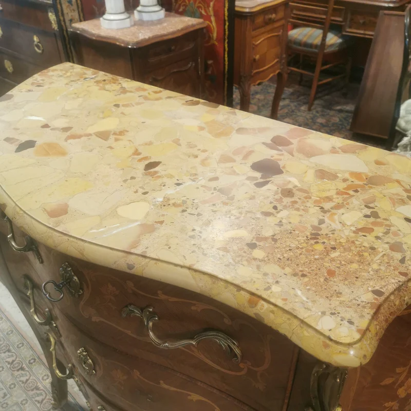 Louis XV three-drawer chest of drawers with marble marquetry