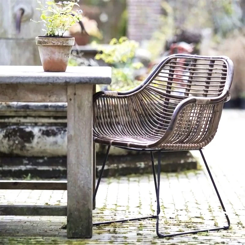 Contemporary Nordic Handwoven Natural Rattan Lounge Chair - Accent Chair With Ergonomic Backrest & Iron Base For Indoor & Outdoor Living