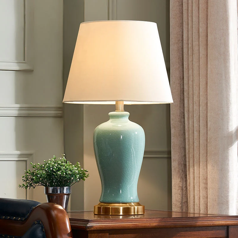 Contemporary Nordic Ceramic Fabric Elliptical Base 1-Light Table Lamp For Bedroom And Living Room
