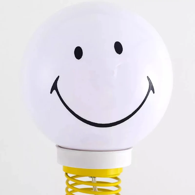 Contemporary Creative PVC Iron Smile Cartoon Character 1-Light Standing Floor Lamp For Living Room