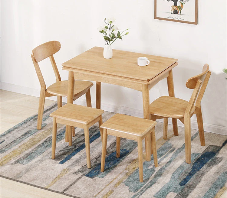 Mesa de madera maciza plegable y expandible con diseño que ahorra espacio