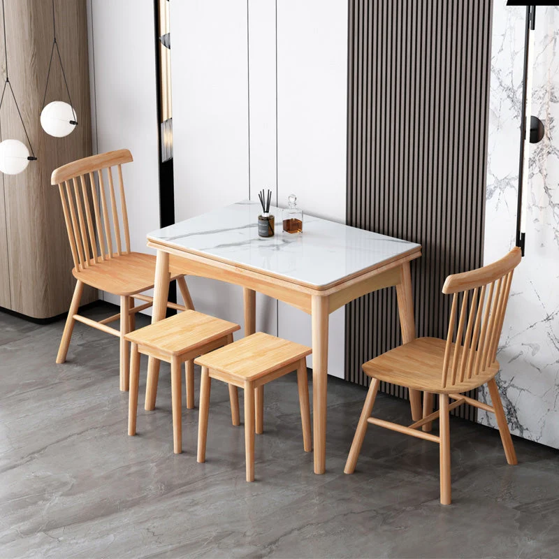 Mesa de madera maciza plegable y expandible con diseño que ahorra espacio