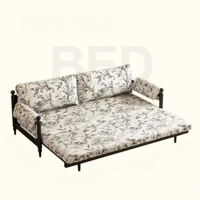 Sofá cama Gland con estructura de madera maciza de fresno y tapizado en tela de terciopelo estampada.