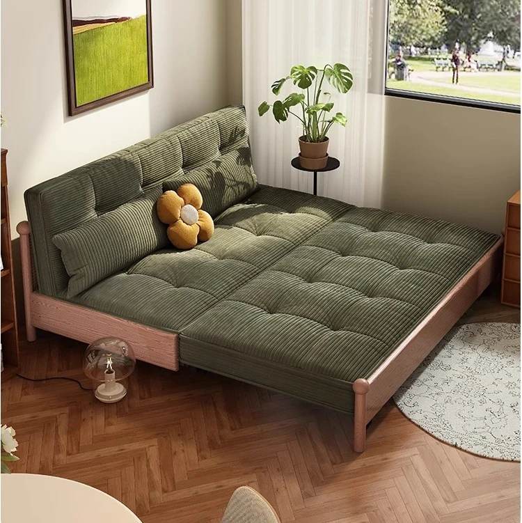 Sofá cama con estructura metálica y tapizado en pana, con espacio de almacenamiento debajo.