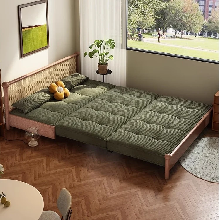 Sofá cama con estructura metálica y tapizado en pana, con espacio de almacenamiento debajo.