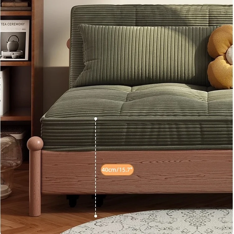Sofá cama con estructura metálica y tapizado en pana, con espacio de almacenamiento debajo.