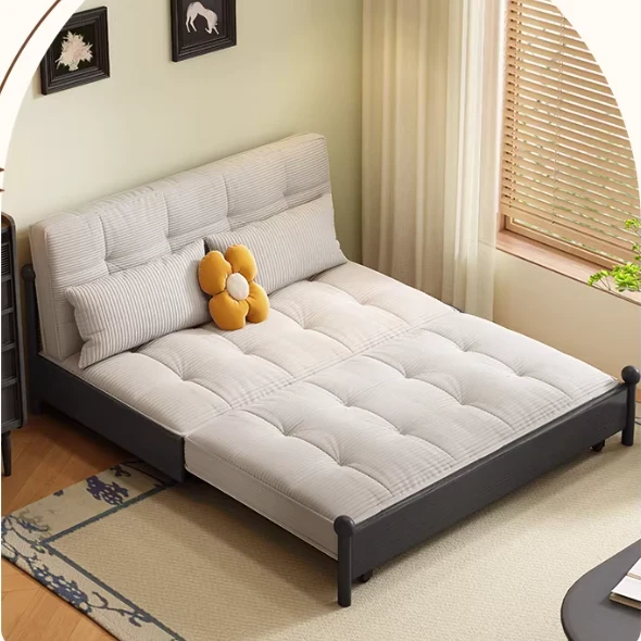 Sofá cama con estructura metálica y tapizado en pana, con espacio de almacenamiento debajo.