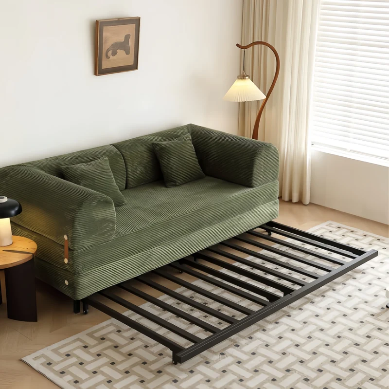 Sofá cama tapizado en tela de pana con estructura de metal