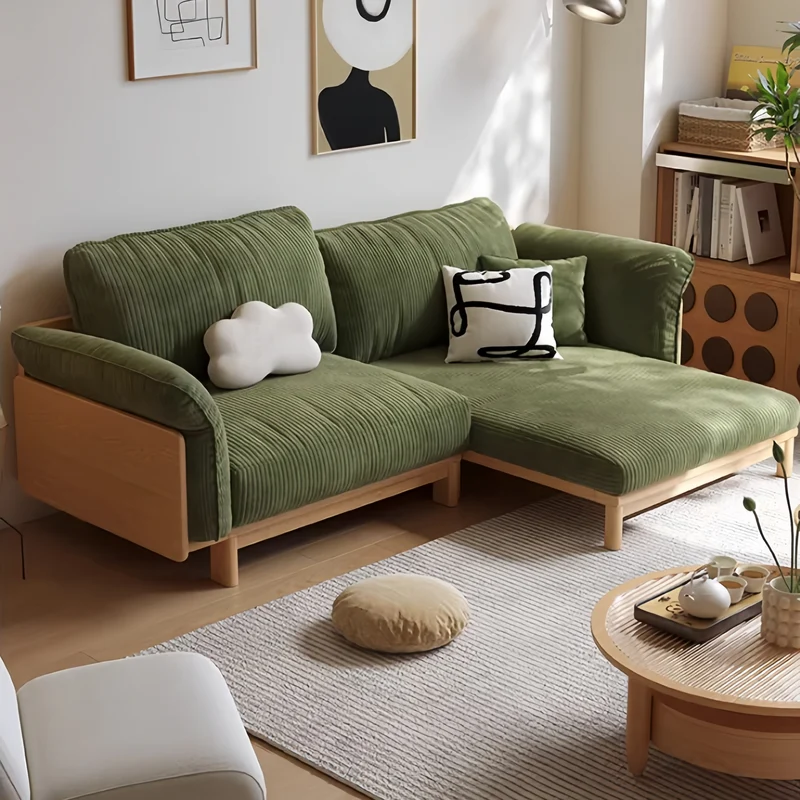 Sofá cama Japandi con estructura de madera maciza y tapizado en tela de pana.