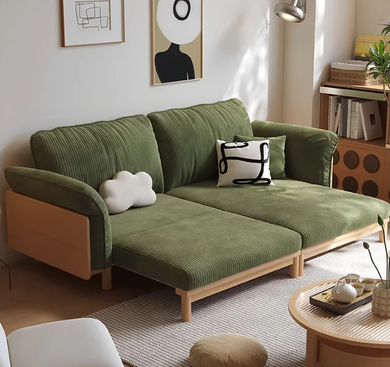 Sofá cama Japandi con estructura de madera maciza y tapizado en tela de pana.