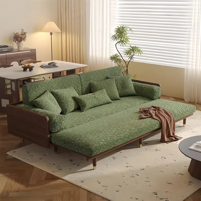 Sofá cama de madera maciza de fresno con tapizado de tela chenilla con estampado de trébol de cuatro hojas.