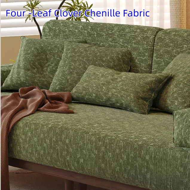 Sofá cama de madera maciza de fresno con tapizado de tela chenilla con estampado de trébol de cuatro hojas.
