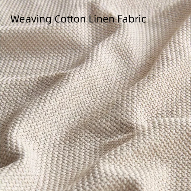 Sofá cama de madera maciza de fresno con tapizado de tela chenilla con estampado de trébol de cuatro hojas.