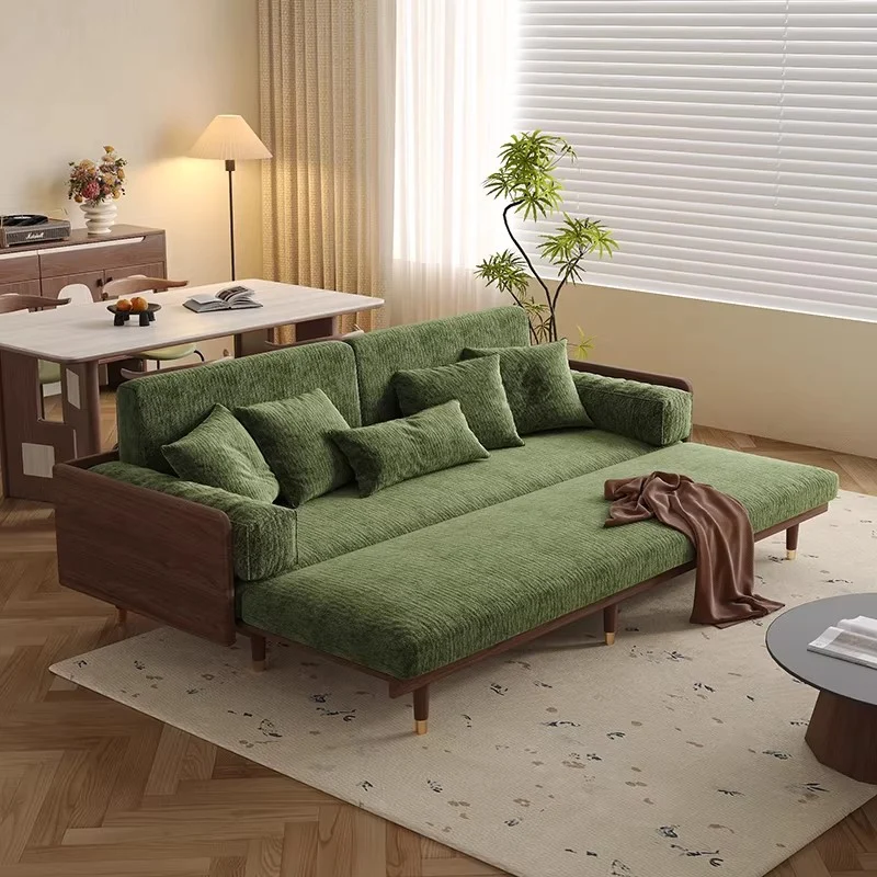 Sofá cama de madera maciza de fresno con tapizado de tela chenilla con estampado de trébol de cuatro hojas.