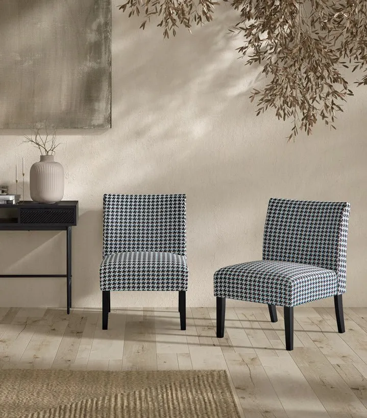 Armchair upholstered in houndstooth fabric with wooden legs