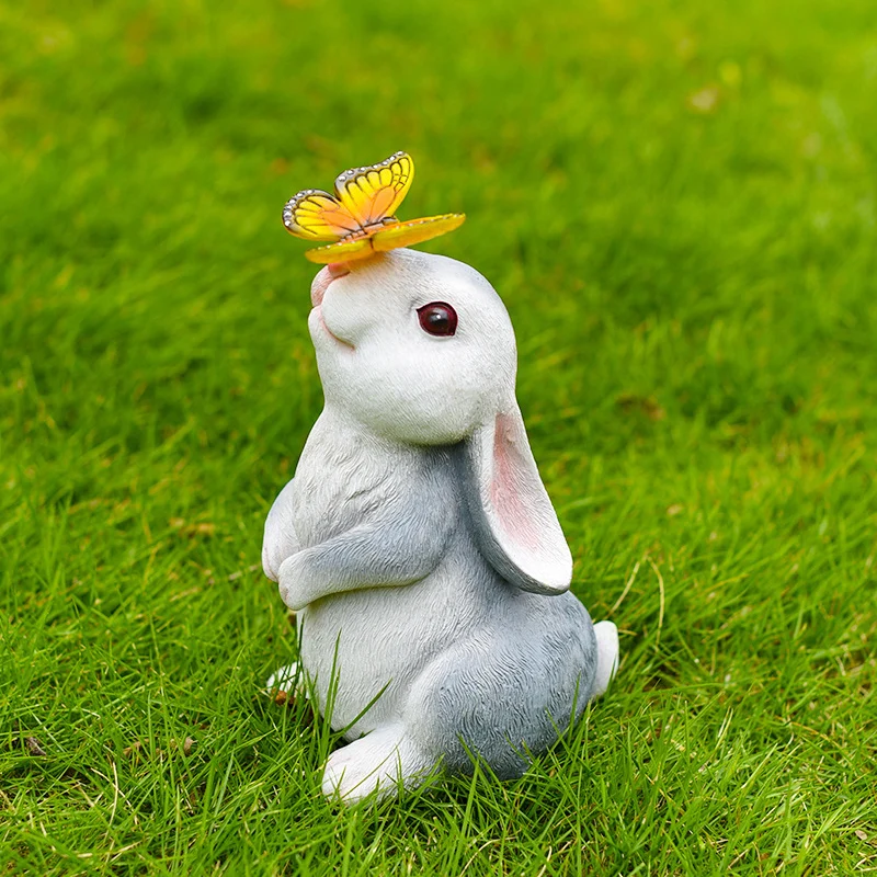 Modern Art Deco Solar Waterproof Resin Cartoon Rabbit Holding Flower Butterfly LED Outdoor Light Landscape Lighting For Garden