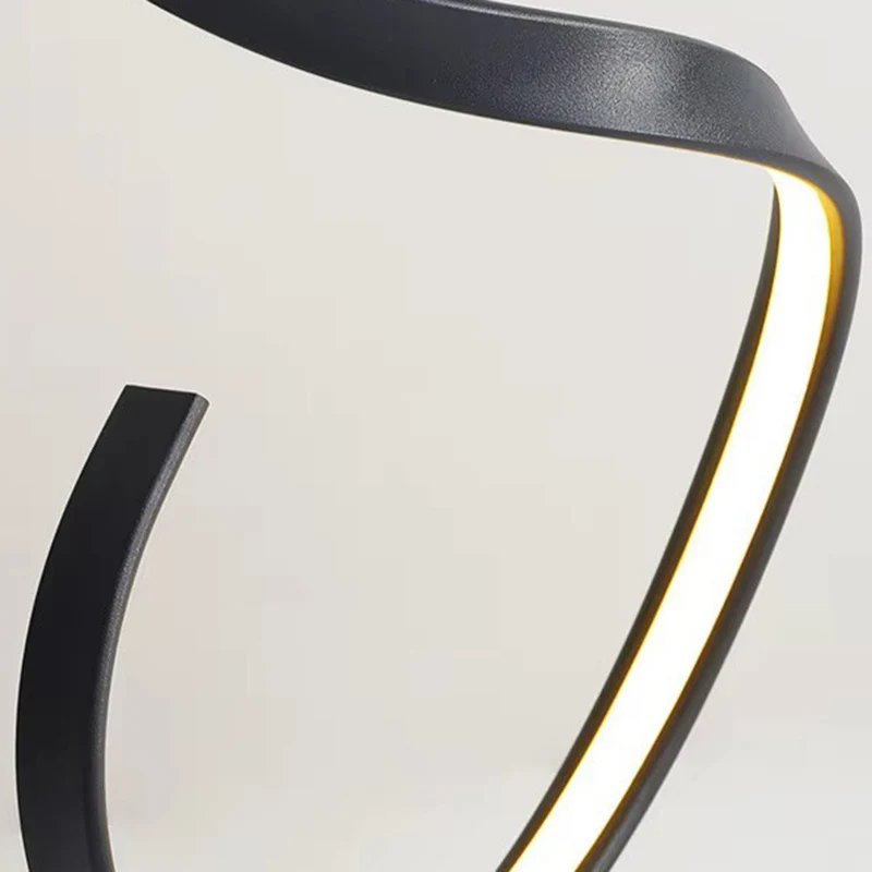 Contemporary Nordic LED Floor Lamp – Curved Iron Frame with PVC Shade for Living Room