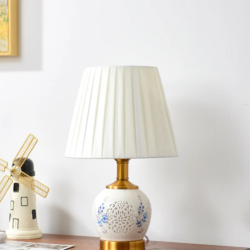 Traditional Chinese Round Table Ball Flower Hollowed Metal Ceramic Fabric 1-Light Table Lamp For Bedroom