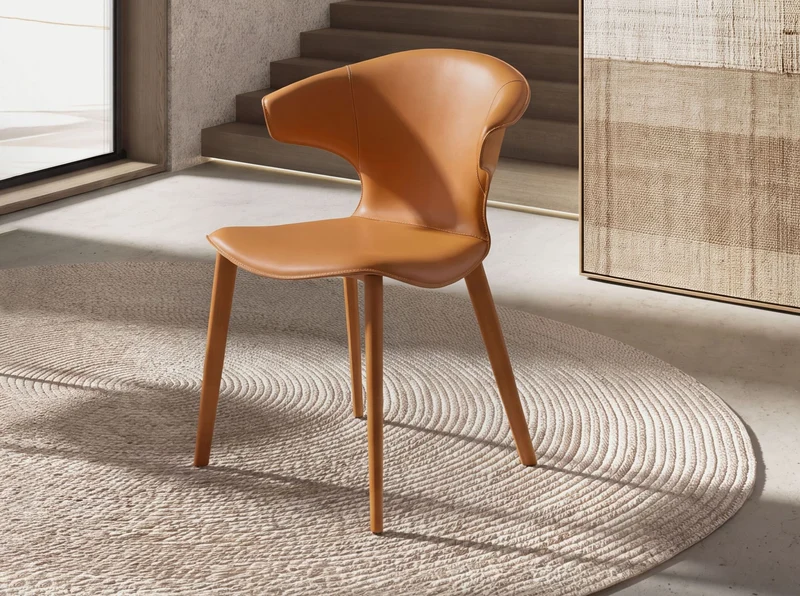 Dining chair in orange bonded leather