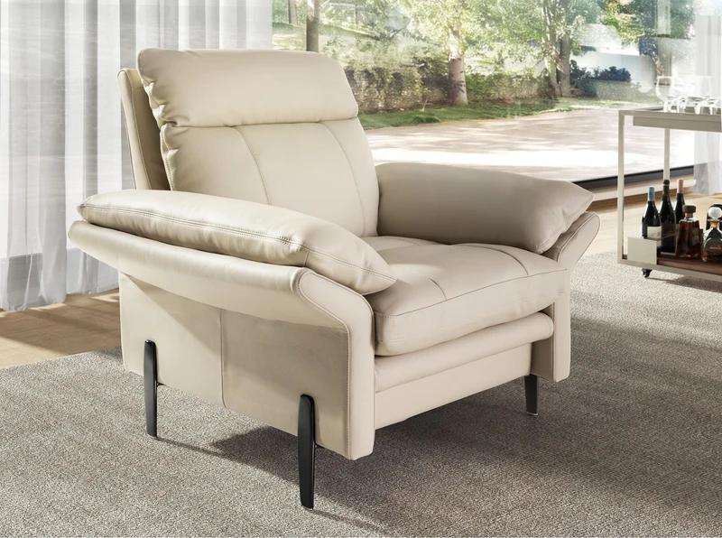 Armchair in taupe grey leather
