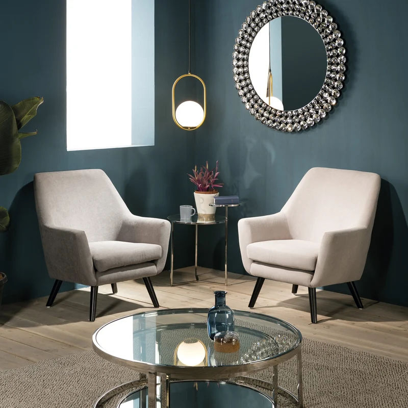 Armchair upholstered in grey fabric