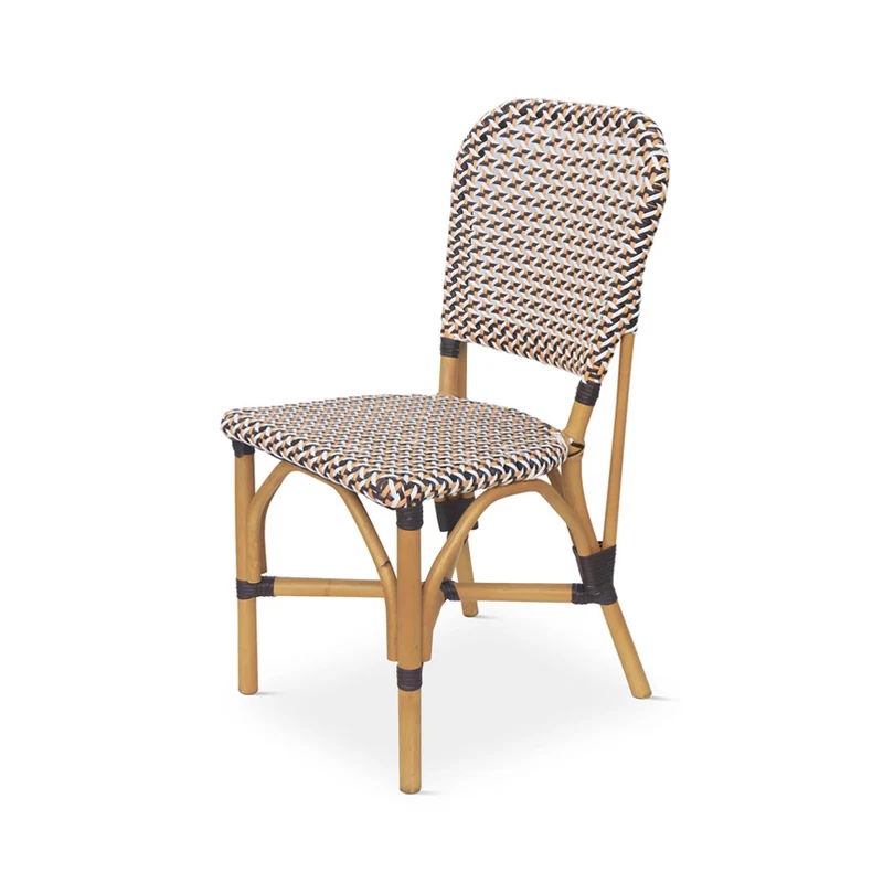 Chair upholstered in rattan