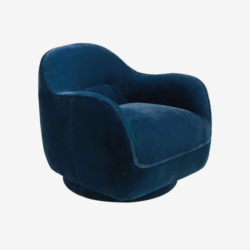 Dark blue velvet swivel armchair