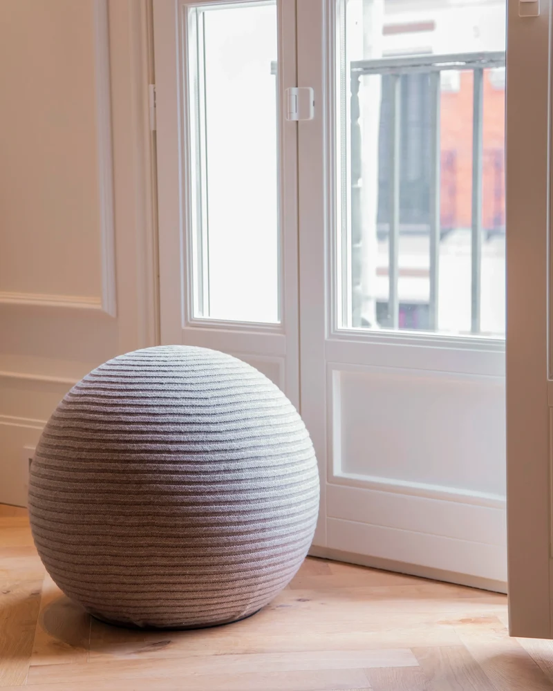 Brown knitted wool ottoman