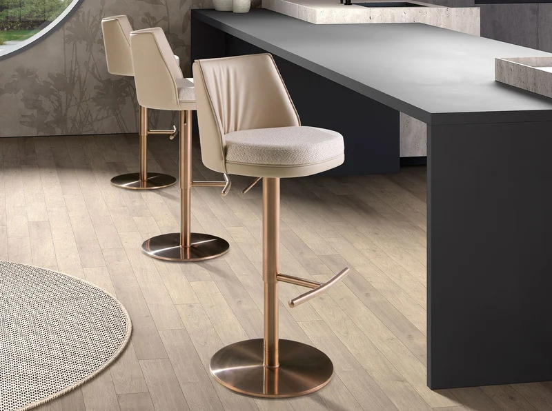 Swivel stool in mottled cream fabric and cream faux leather