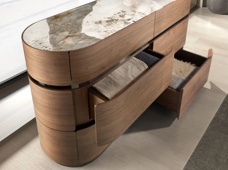 Walnut chest of drawers, blackened steel base and porcelain stoneware top