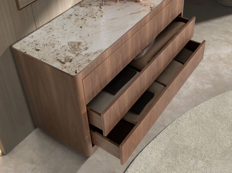 Chest of drawers in walnut, polished gold steel, and porcelain marble top