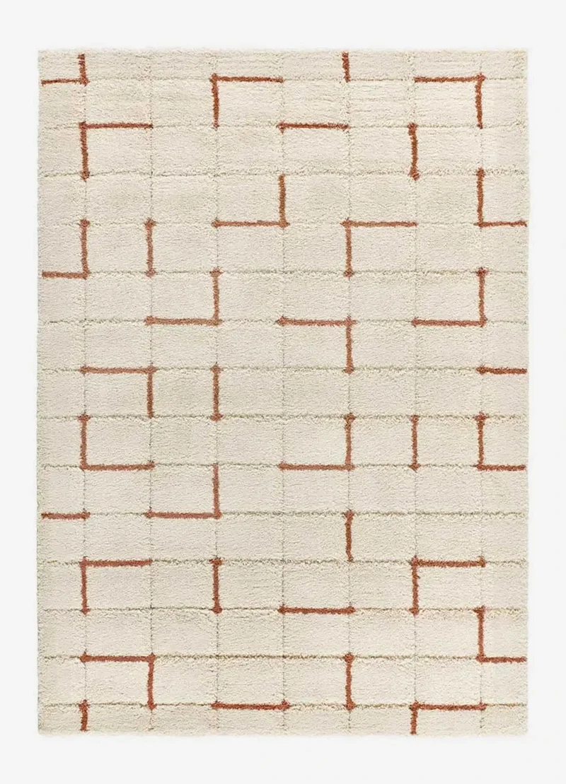 Brenda 8834 shaggy rug with a geometric pattern in white