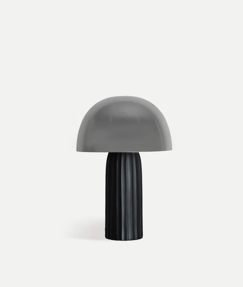Silver iron table lamp: contrast and character in lighting