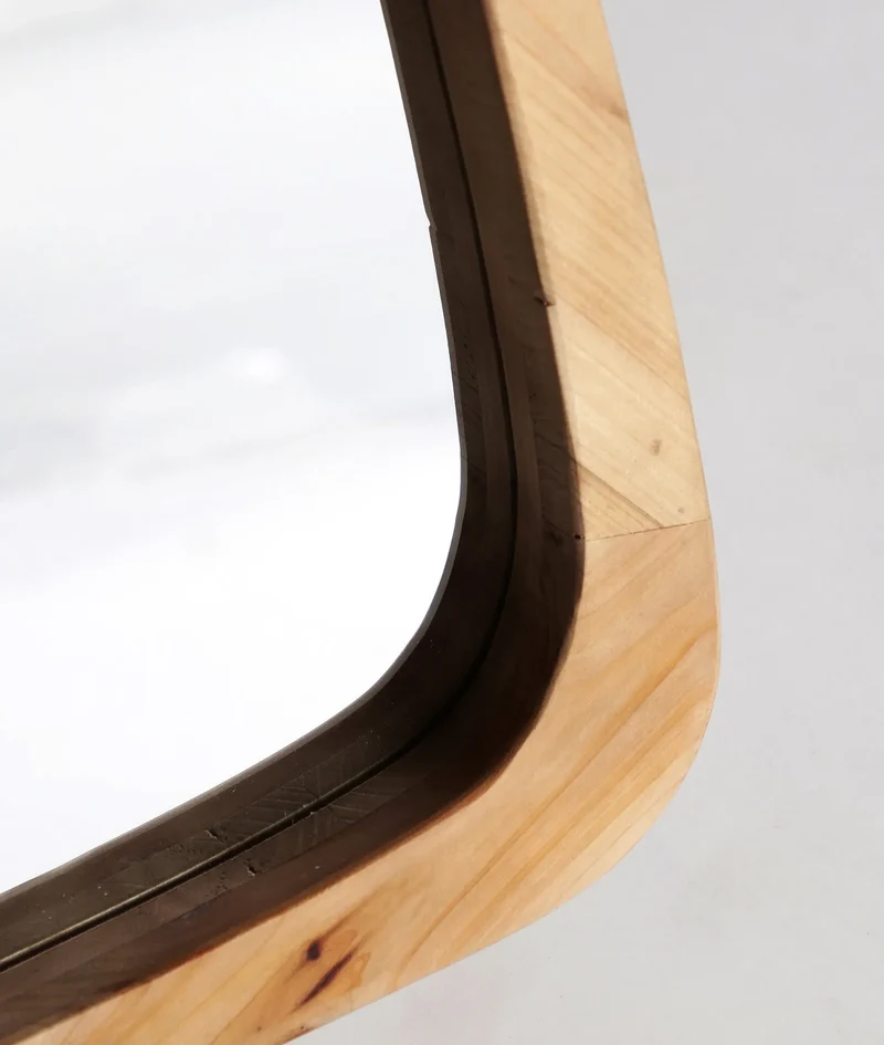 LECCO mirror made of natural fir wood with an organic shape