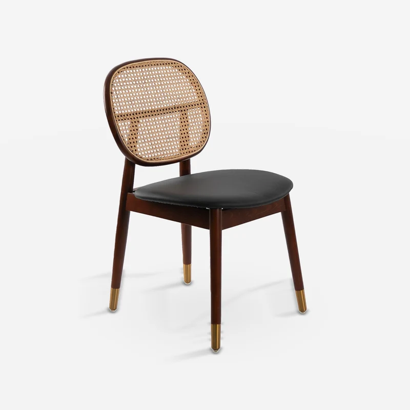 Black rattan and leatherette chair
