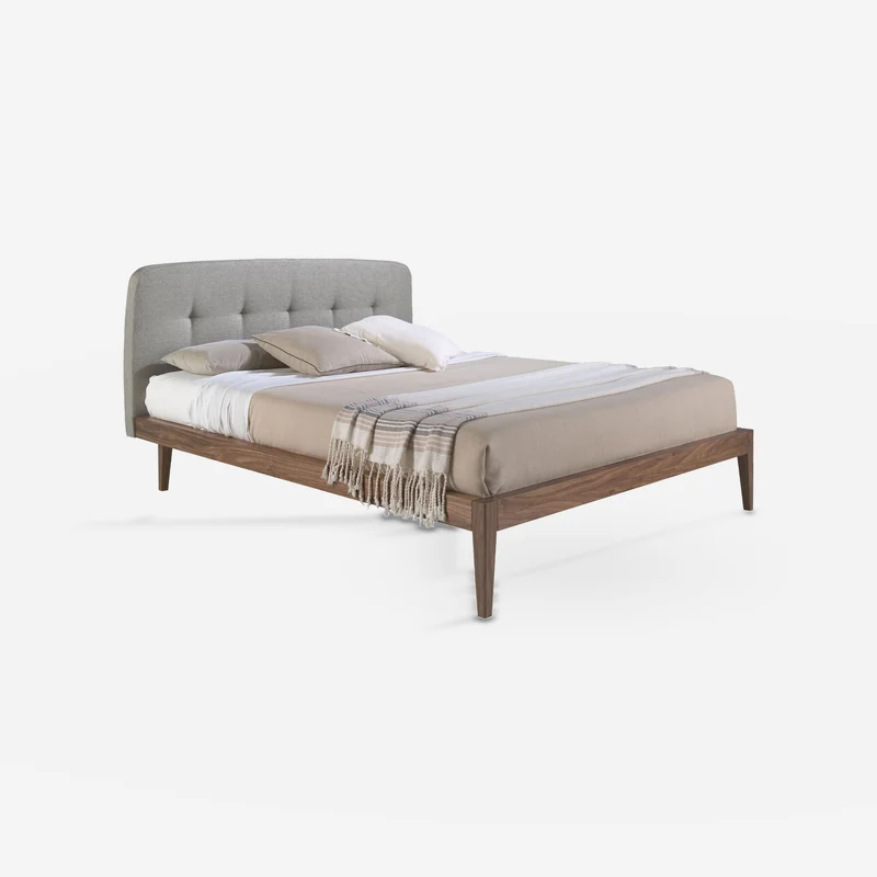 Tufted bed in grey fabric