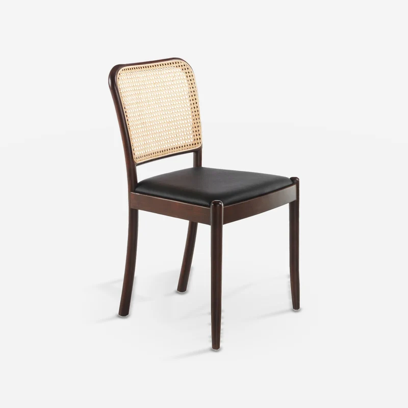 Black rattan and leatherette chair